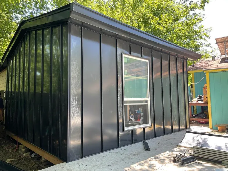 Black standing seam metal wall panels for Roof Inspection in Tenafly